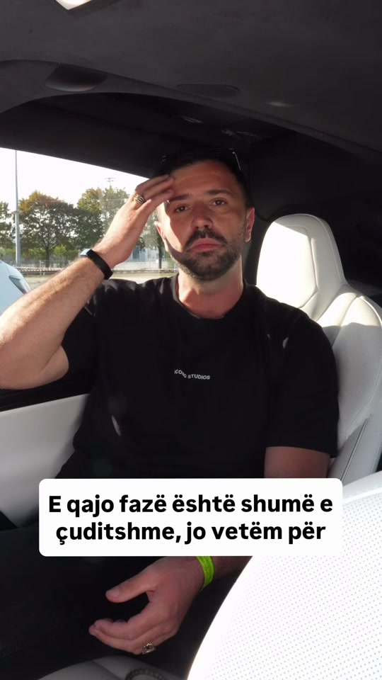 Eduard Luta sitting in a car, speaking about grief and the death of someone loved.