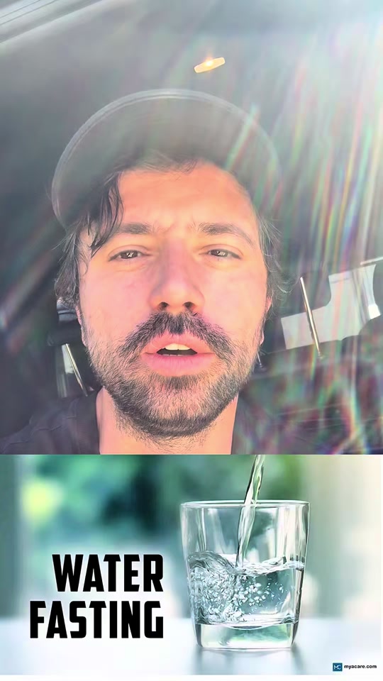 Eduard in a black cap inside a car, with the original water-fasting graphic below him.